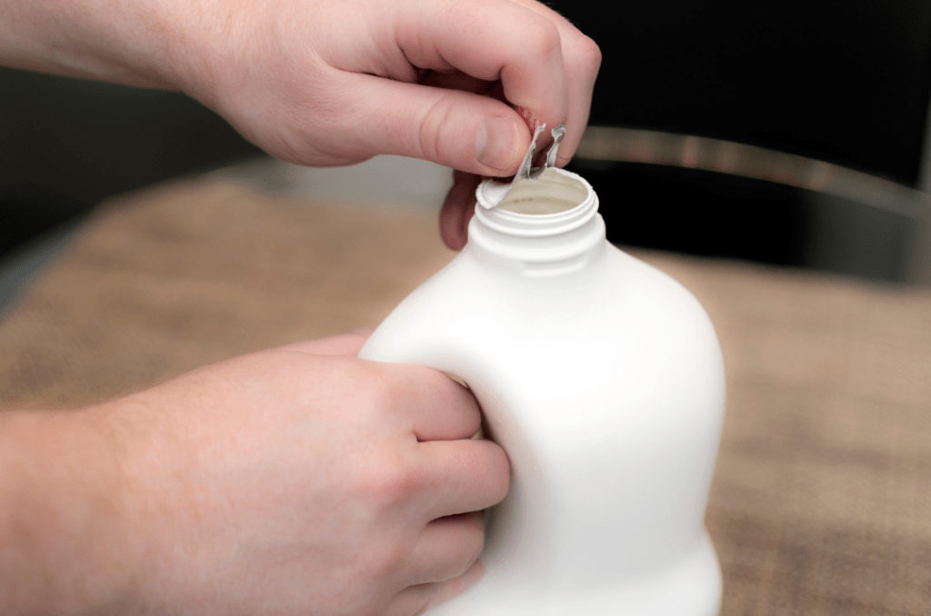 Opening plastic  milk bottle
